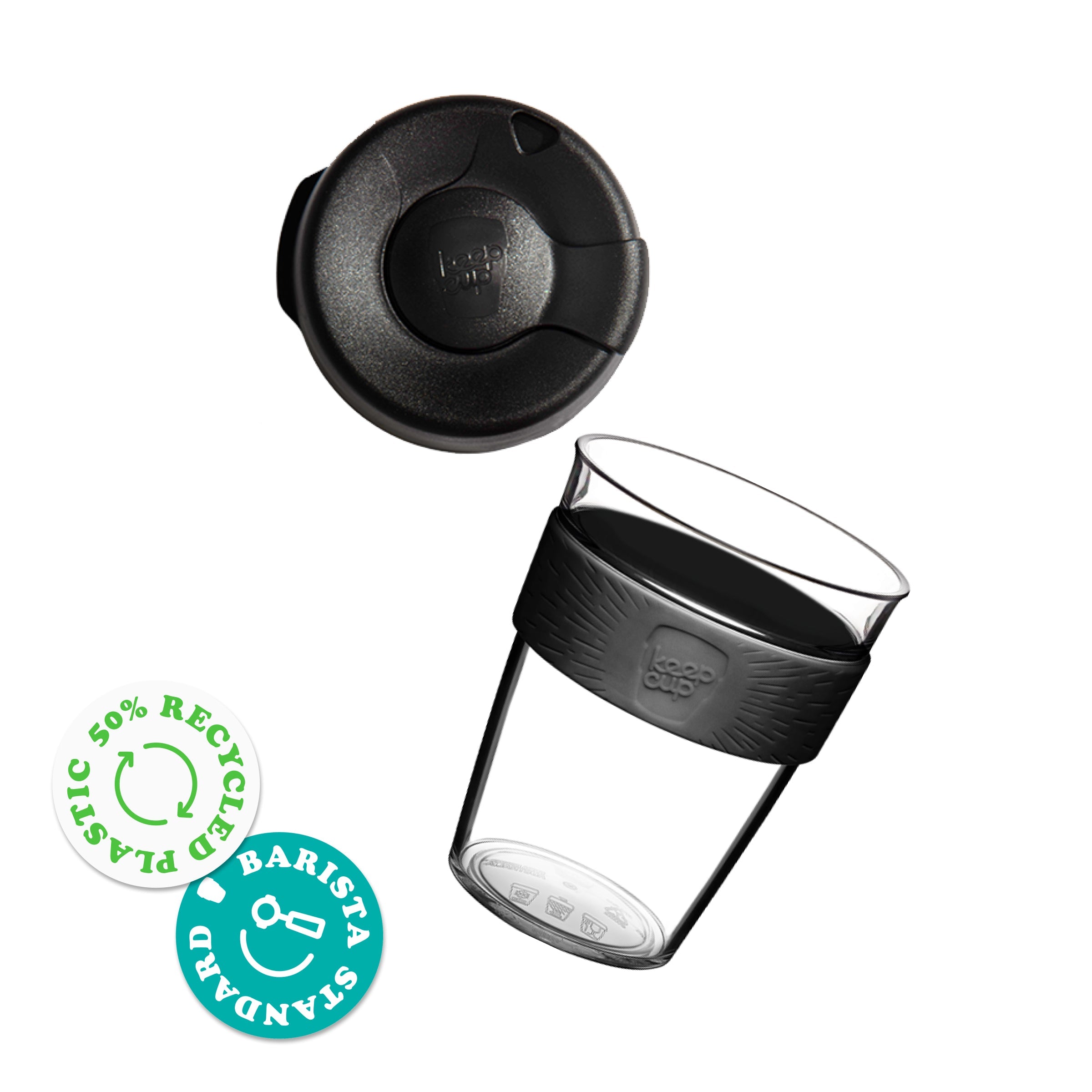 KeepCup Original Clear M 12oz shown as an exploded view with the lid separated from the clear reusable cup featuring a band. Badges indicate 50% recycled plastic and Barista Standard compatibility.