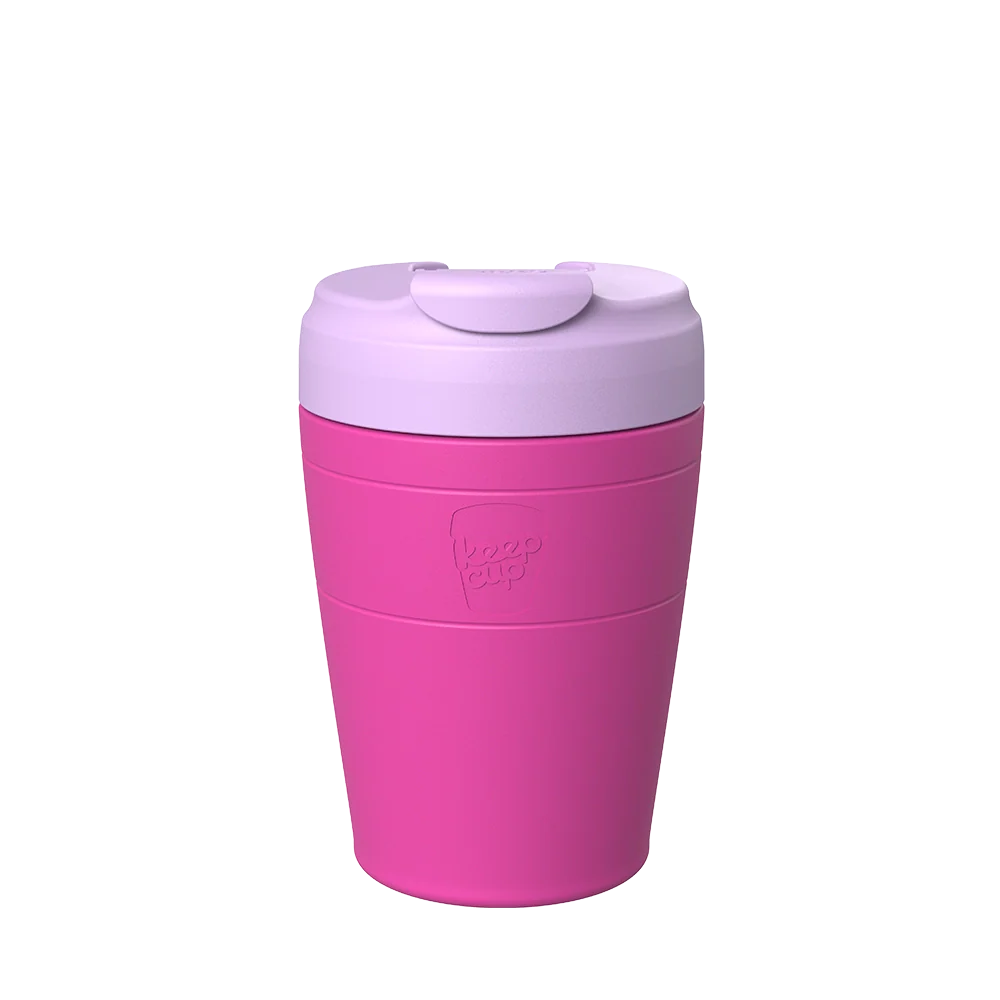 Pink KeepCup stainless steel travel mug on a white background