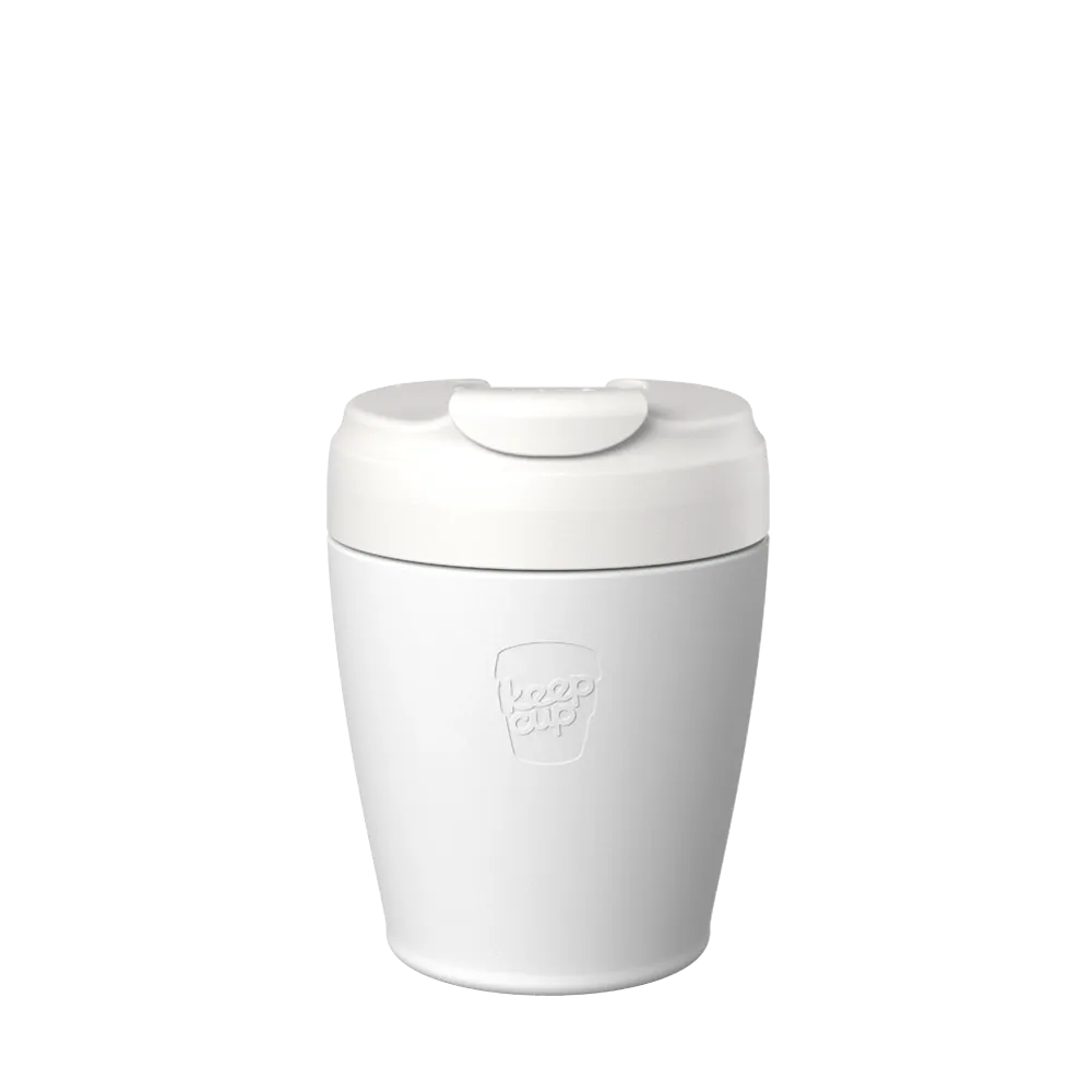 White KeepCup thermos with a lid on a white background