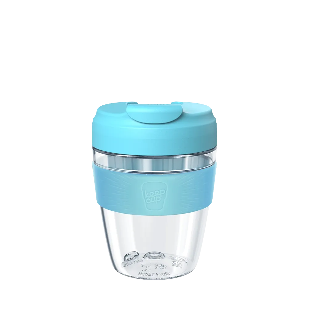 Clear Commuter mug with a blue lid on a white background