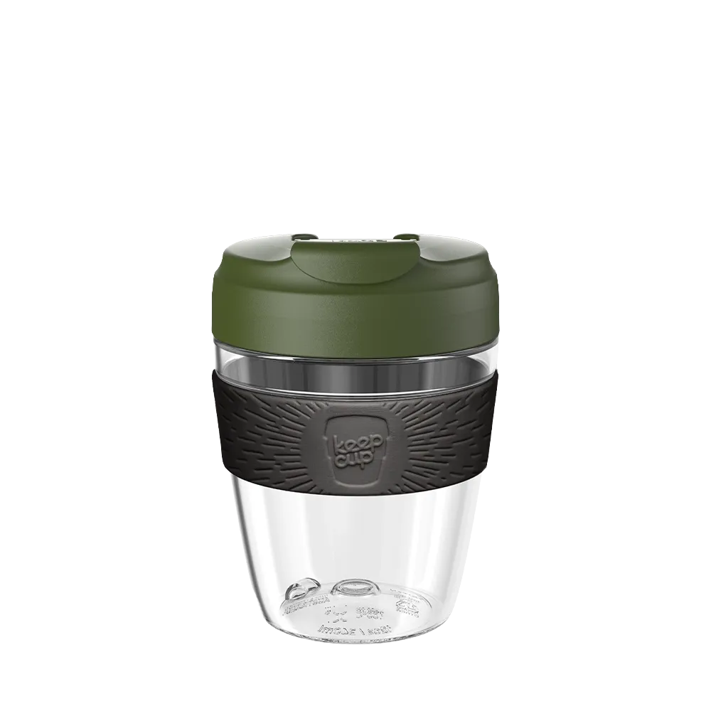 Clear reusable coffee cup with pine green lid and black silicone band