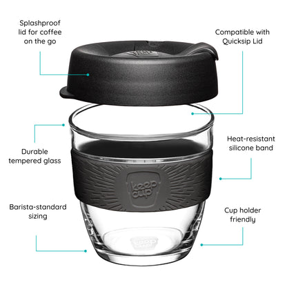 KeepCup Reusable coffee cup with black lid and band, featuring text on a white background