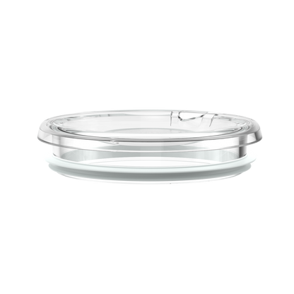 KeepCup Quicksip Lid in clear, shown from a low side angle against a white background, displaying the transparent plastic lid with sliding sip opening and white silicone sealing ring.