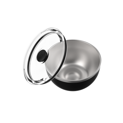 KeepCup Go Bowl Luxe in Black with flat lid, shown at an angle with the transparent lid lifted and resting against the stainless steel bowl, revealing the brushed metal interior and black exterior base.