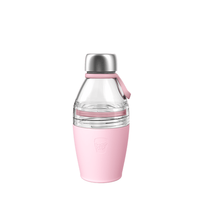 KeepCup Helix Bottle Clear Top in Pashmak Pink, 420ml, shown against a white background featuring a plastic glass upper section with stainless steel cap, pink silicone carry loop, and pink insulated base with embossed KeepCup logo.