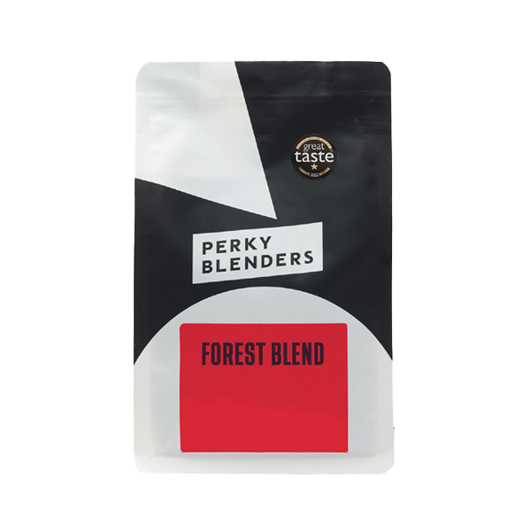 A 1 kg bag of Perky Blenders Forest Blend coffee featuring a modern black and white geometric design with a red label, displaying a Great Taste award badge.