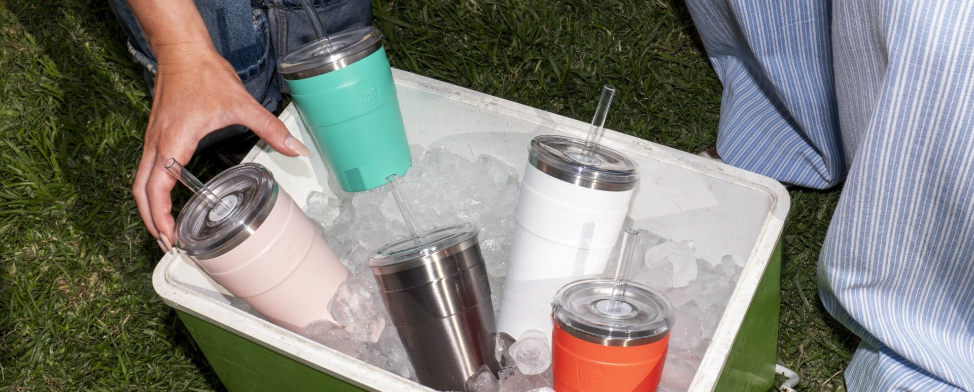 Woman holding KeepCup Sip & Chill Thermal travel Mug