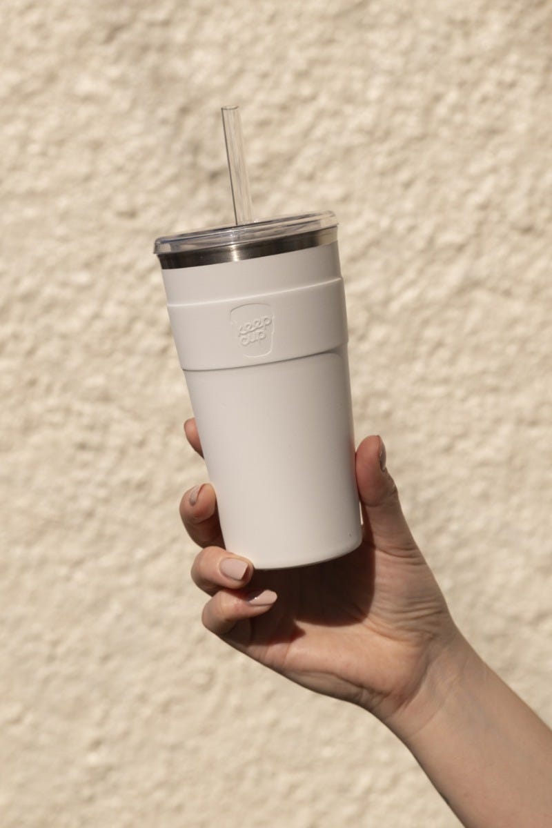 Woman holding KeepCup Sip & Chill Thermal travel Mug